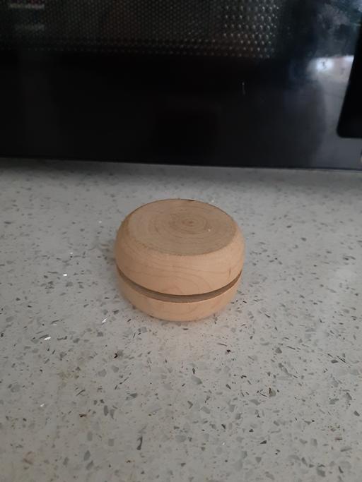  — wood yoyo