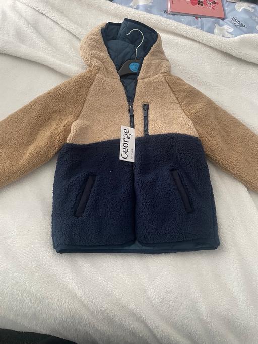  — Coat
