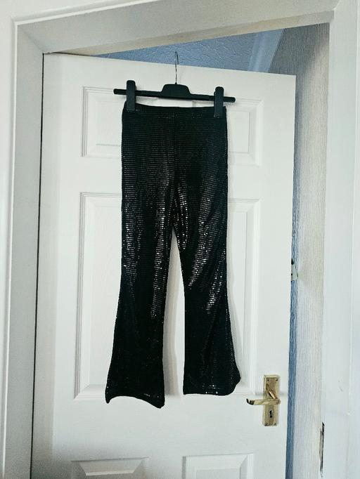  — Girls shimmer trousers, age 9/10.