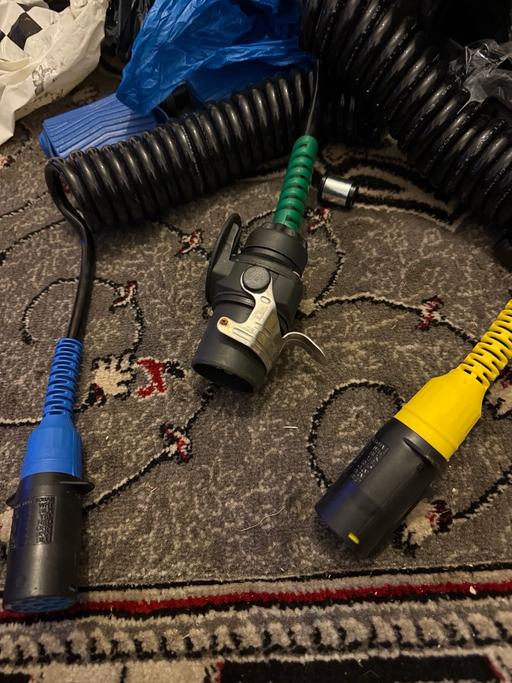  — Electric coil, spiral cable adapter