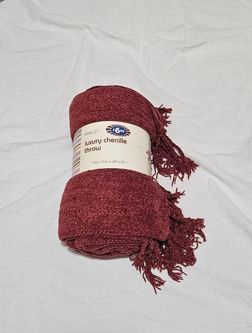  — New Throw