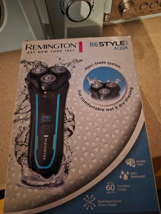  — remington  R6 shaver