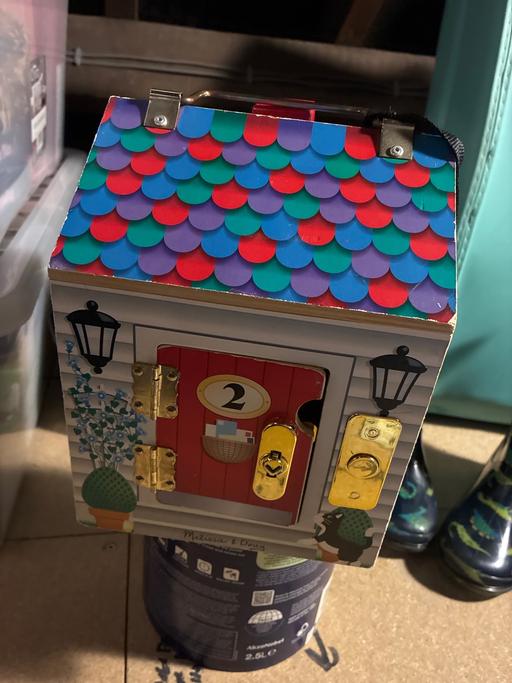  — Melissa and Doug wooden house with noise