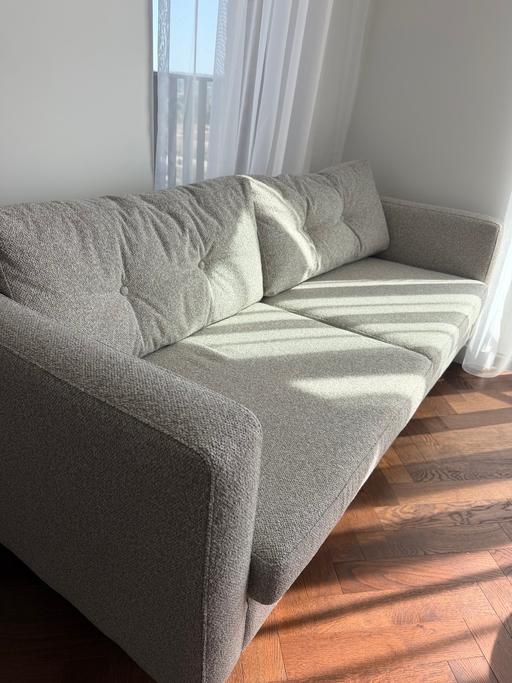  — Brand new grey sofa