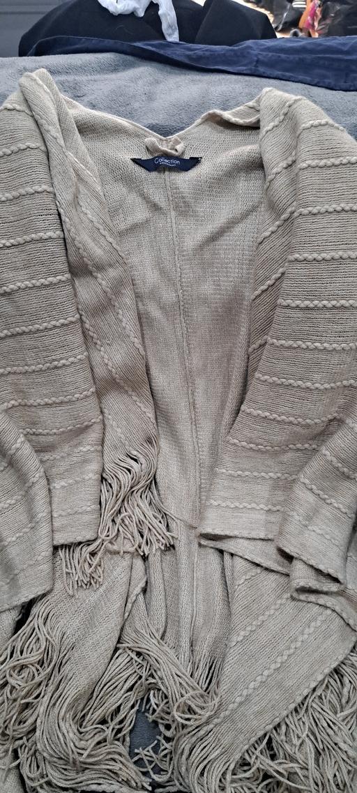  — Debhams Poncho
