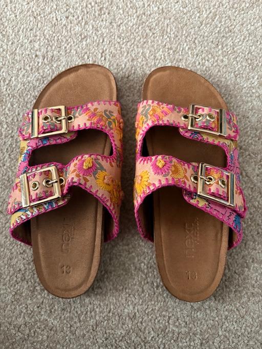  — Next Sandles