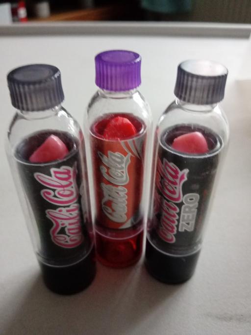  — 3 brand new coca cola LIP GLOSS SETS
