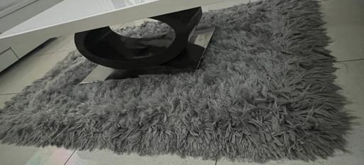  — Grey fluffy rug