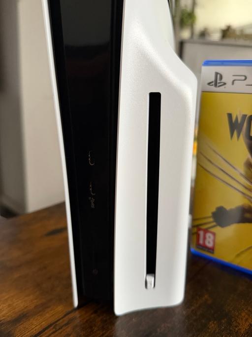  — PS5 PRO with disc drive and wolverine