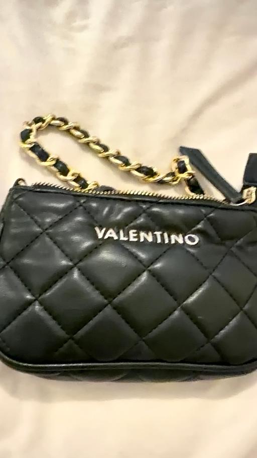  — Black handbag