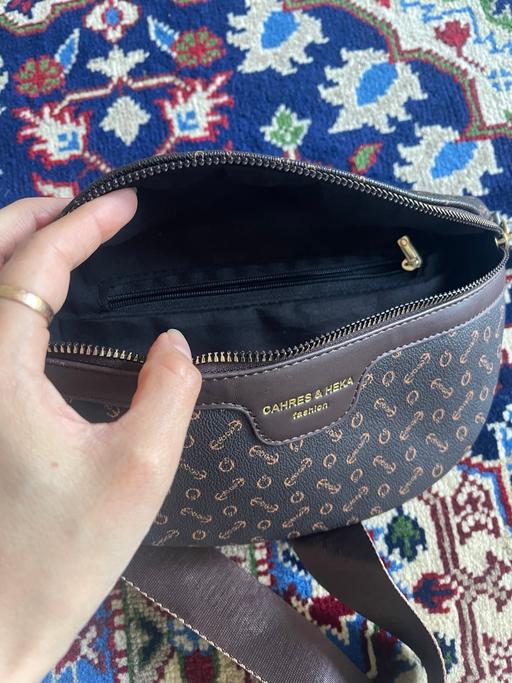  — Cross body bad