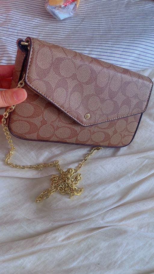  — Women long strap shoulder bag