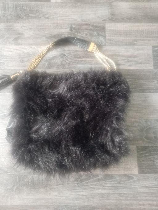  — large leather /fur River Island bag