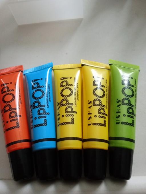  — 5  brand new ladies LIP GLOSS SETS