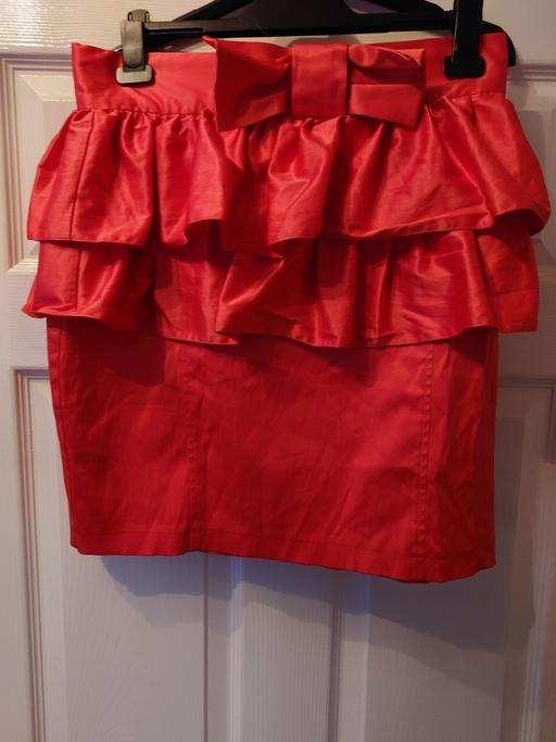  — Women's pink ruffle skirt size 14