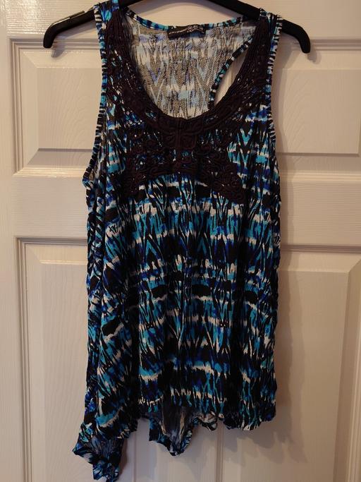  — Women's patterned sleeveless top size 14