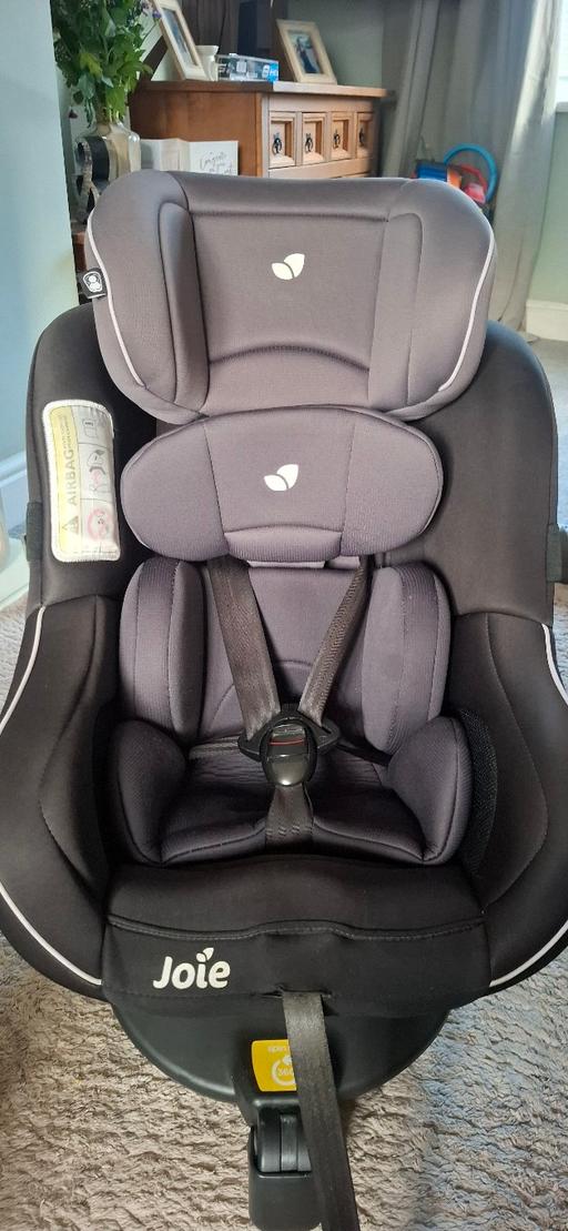  — Joie 360 swivel car seat.