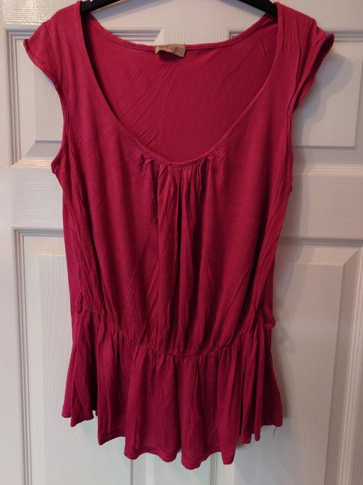 — Women's pink sleeveless top size 14