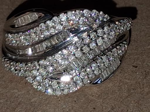  — 9ct Gold and Diamond ring.