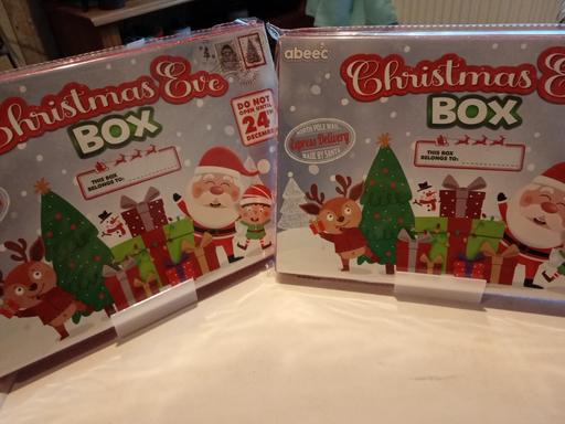  — 2 brand new Christmas eve boxes