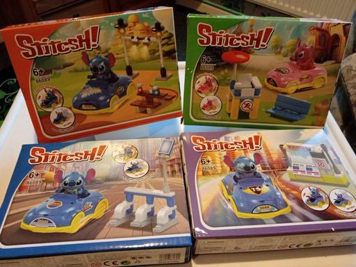  — new set of 4 Stitch character toy car sets