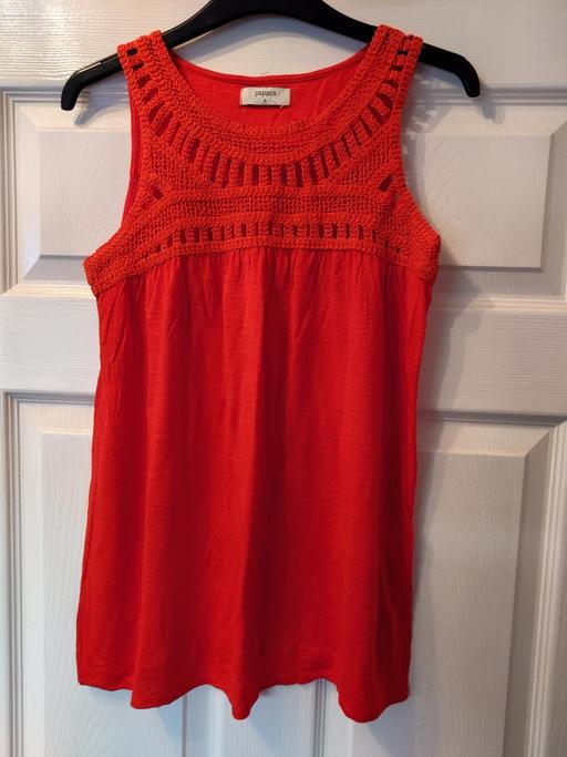  — Women's orange sleeveless top size 8