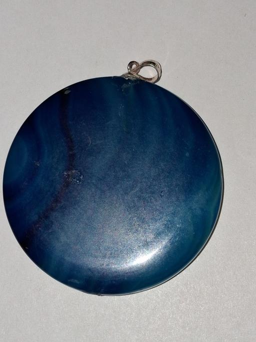  — Pendant.