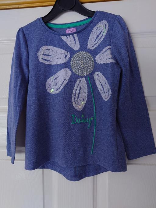  — Girls blue long sleeve top size 4-5 years