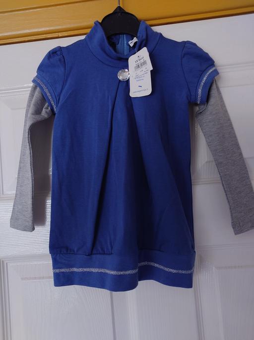  — Girls long sleeved dress size 18 months