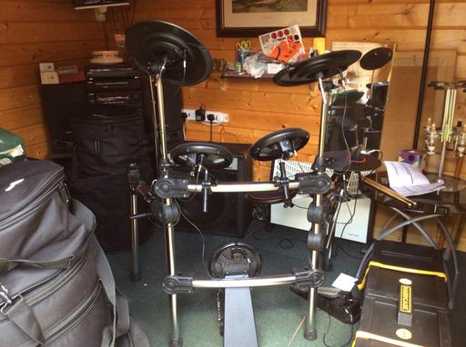  — Electronic drum kit plus amplifier