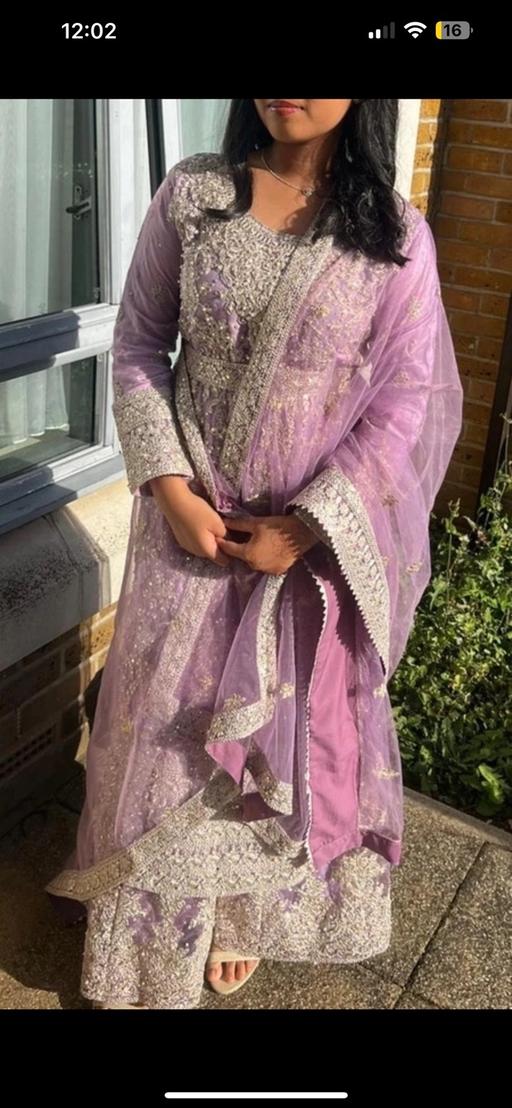  — Asian suit
