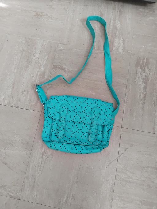  — Satchel.