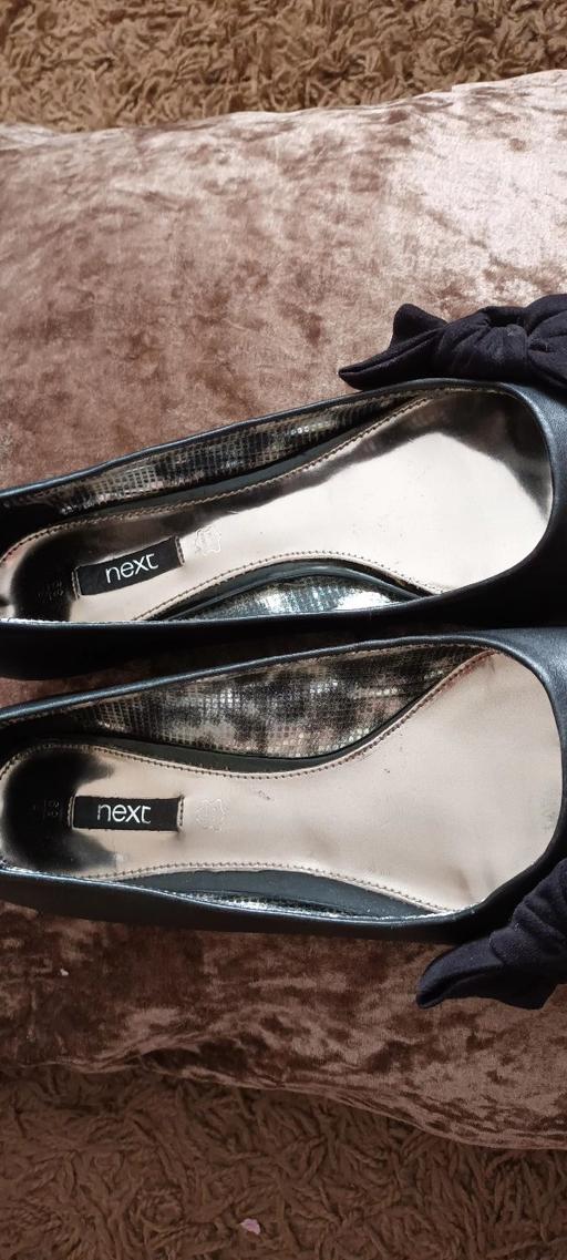  — next shoes