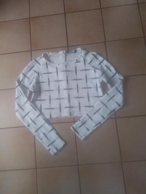  — LADIES NEW TOP