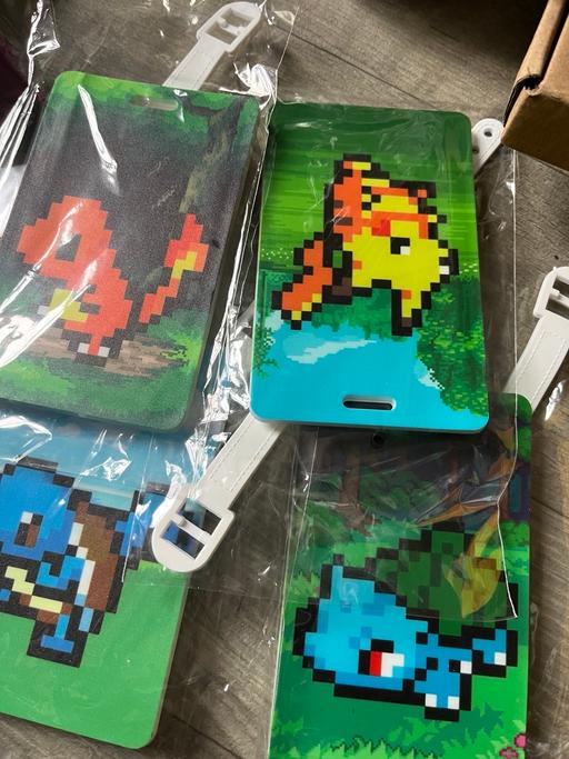  — Four new Pokemon luggage bag tags