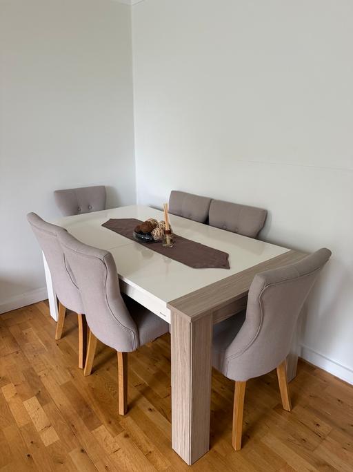  — Dining table with chairs