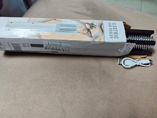  — electric fish descaler