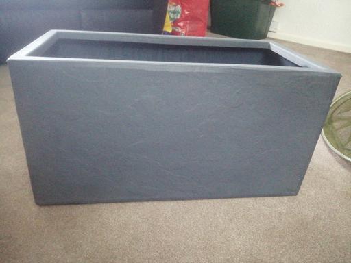  — New grey hard plastic oblong planter