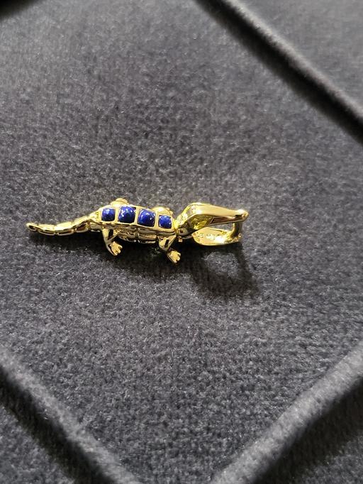  — the Pandora Alligator Charm, featuring 14k