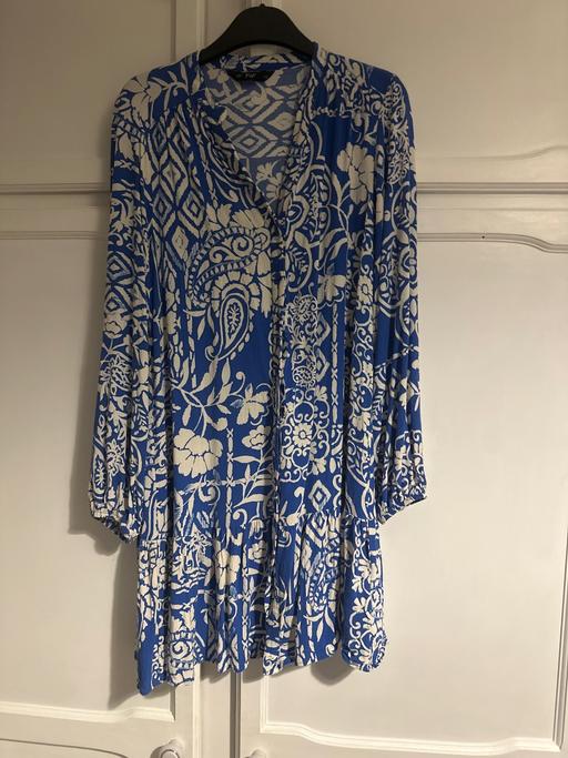  — Dress