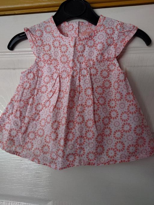  — Baby girls patterned top size 3-6 months