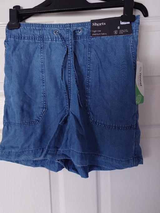 — Women's blue high rise shorts size 6