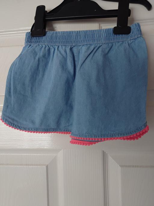  — Girls blue shorts size 4-5 years