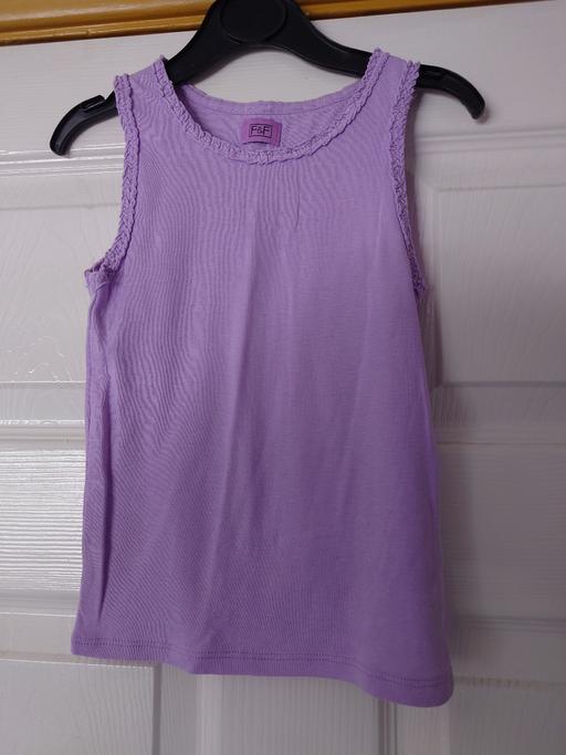  — Girls purple vest top size 4-5 years