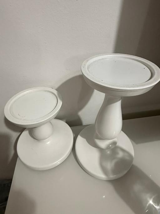  — White candles holders