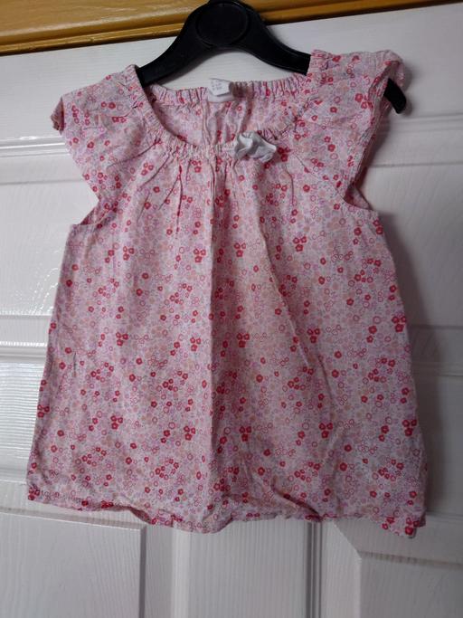  — Baby girls floral top size 9-12 months