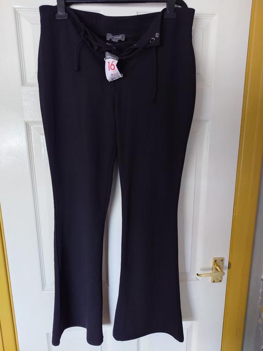  — Women's black trousers size 16