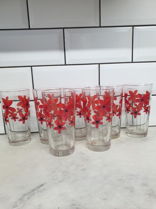  — 7 heavy  tall glasses