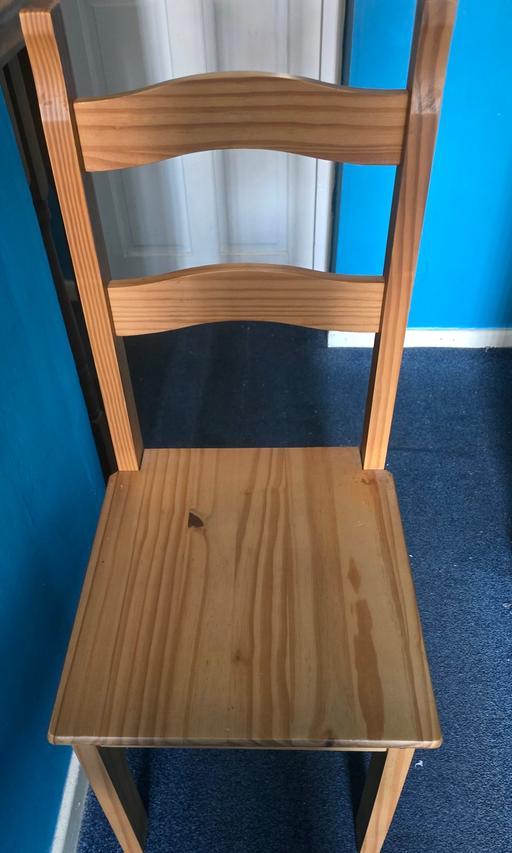  — wooden dining table and four chairs