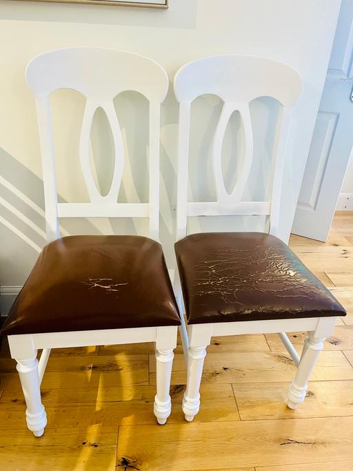  — Two identical wooden leather dining chairs